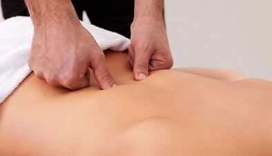 Pain massage in the lower back